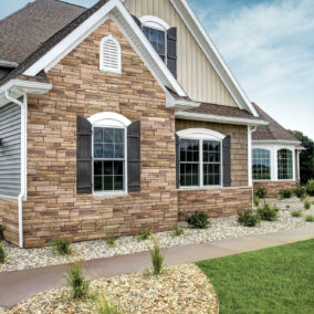 Home featuring Versetta Stone ledgestone in the color Plum Creek